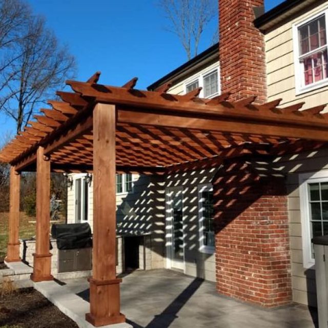 Outdoor patio with attached pergola